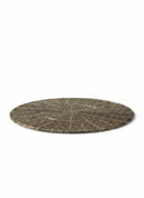 Paniery oval beaded placemat with intricate leaf-like pattern in gold and white.