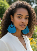 Paniery blue and black handwoven tassel earrings from Rwanda with circular woven tops.