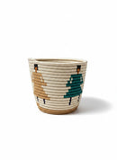 Paniery handwoven graphic basket in cream, tan, teal, and black. Statement decor piece for storage or styling.