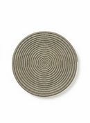 Paniery handwoven neutral grey sisal and raffia wall plate with concentric spiral design.