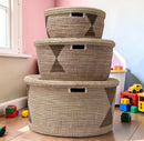 Paniery handwoven Senegalese storage baskets in natural seagrass and recycled plastic with geometric pattern. Set of three.