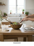 Paniery handcrafted olive wood salad bowl with unique grain and organic shape, perfect for serving or decoration.