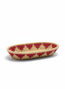 Paniery oval handwoven basket in natural straw with red geometric pattern, ideal for table or decor.