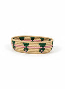 Paniery oval handwoven basket with pink and green stripes, made from natural fibers, ideal for table or home decor.