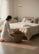 Paniery luxury handwoven Senegal laundry basket with leather trim, natural fibers, lid, and handles.