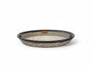 Paniery Senegal handwoven serving tray, 50cm, natural fibers with black leather trim and handles.