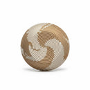 Paniery handwoven spiral woven tray in natural and cream tones, featuring a concentric circular pattern and integrated hanging loop.