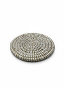 Paniery handwoven white round coaster made of natural fibers with a spiral pattern, perfect for table protection.