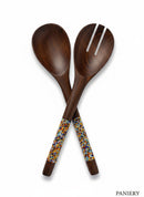 Paniery hand-carved dark wood salad servers with colourful Maasai beadwork handles. One spoon is solid, the other has slots.