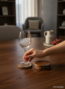 Paniery handcrafted wooden coasters with minimalist African-inspired pattern, set of 4.