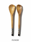 Paniery handcrafted wooden salad servers, one with tines, featuring a natural wood finish and decorative bone inlay handles.