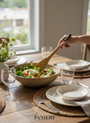 Paniery handcrafted wooden salad servers, ideal for serving and cooking, made from natural wood.