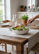 Paniery handcrafted wooden salad servers, ideal for serving and cooking, made from natural wood.