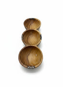 Paniery handcrafted wooden triple serving bowl with African multi-section design and natural wood texture.