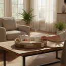Paniery woven decorative wall basket in beige and cream with spiral pattern, handcrafted from natural fibers.