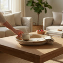 Paniery woven decorative wall basket in beige and cream with spiral pattern. Handcrafted from natural fibers.