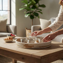 Paniery woven decorative wall basket in beige and cream with spiral pattern, handcrafted from natural fibers.