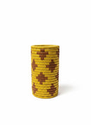 Paniery yellow and brown handwoven decorative vase made from natural fibers with a geometric pattern.